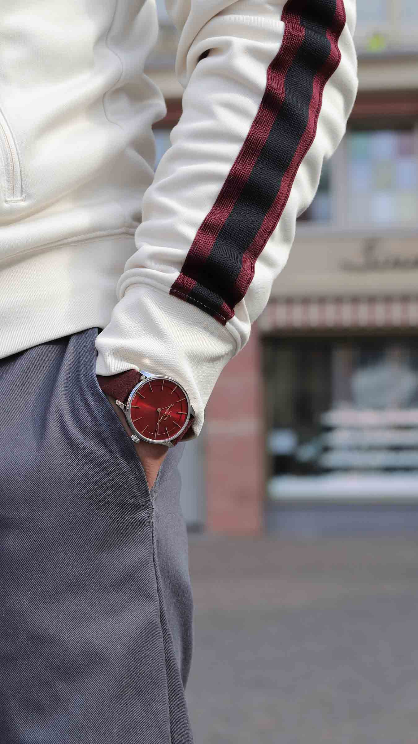 Sinn 1739 Römerberg with red dial and burgundy Alcantara strap on the wrist