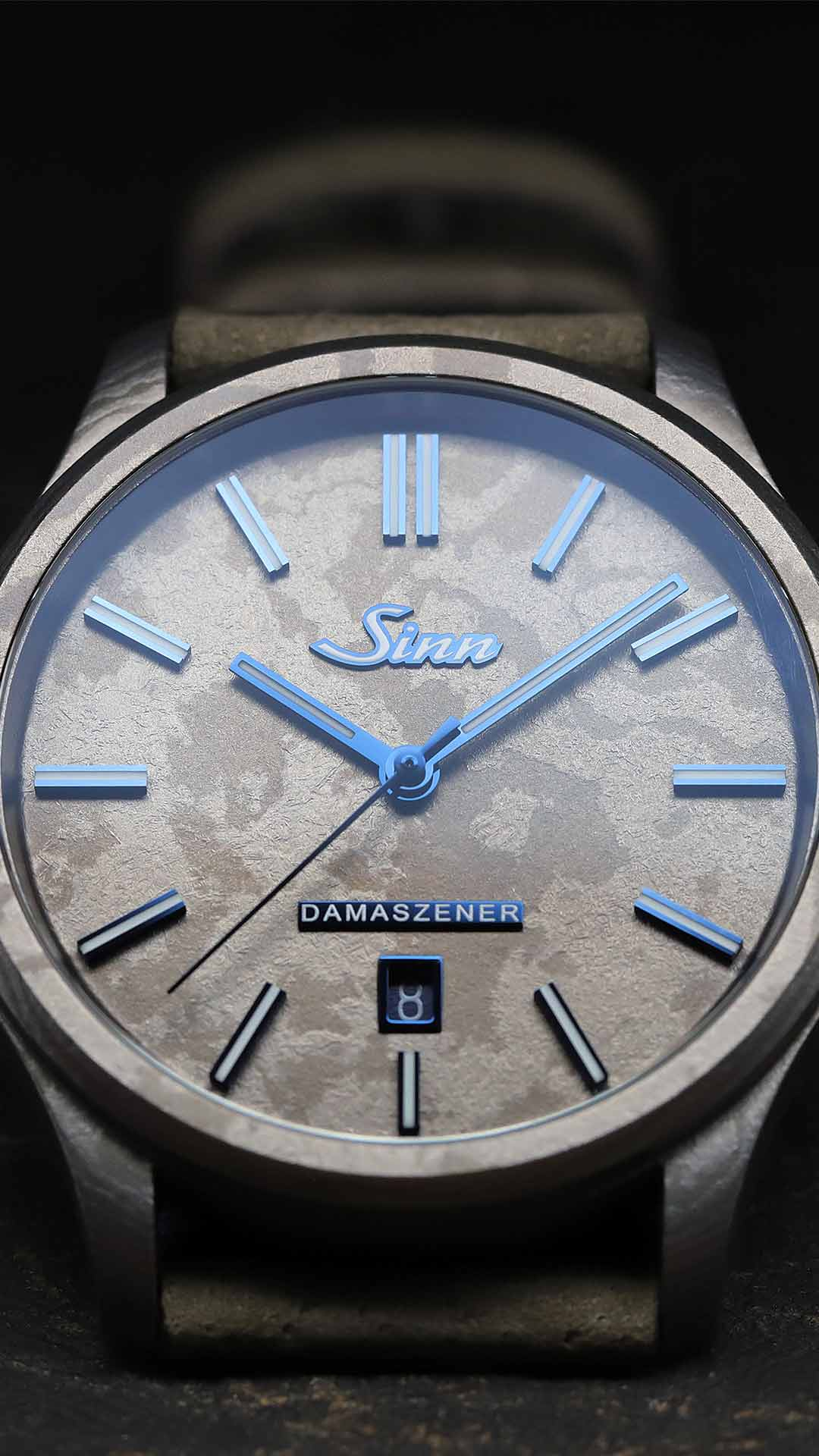 Sinn 1800 TITANDAMASZENER with blue dial accents, shown front view.