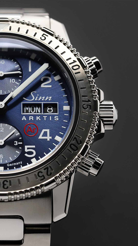 Close-up of the Sinn 206 ARKTIS II with blue dial, stainless steel case, and distinctive bezel.