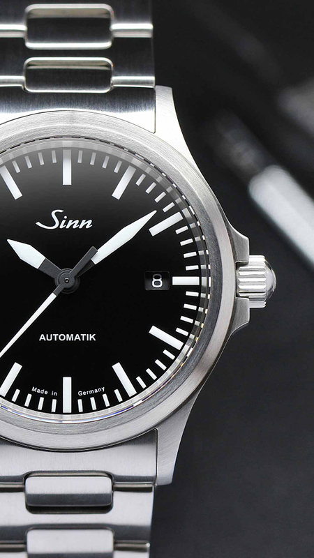 Close-up of the Sinn 556 I with black dial and date display.