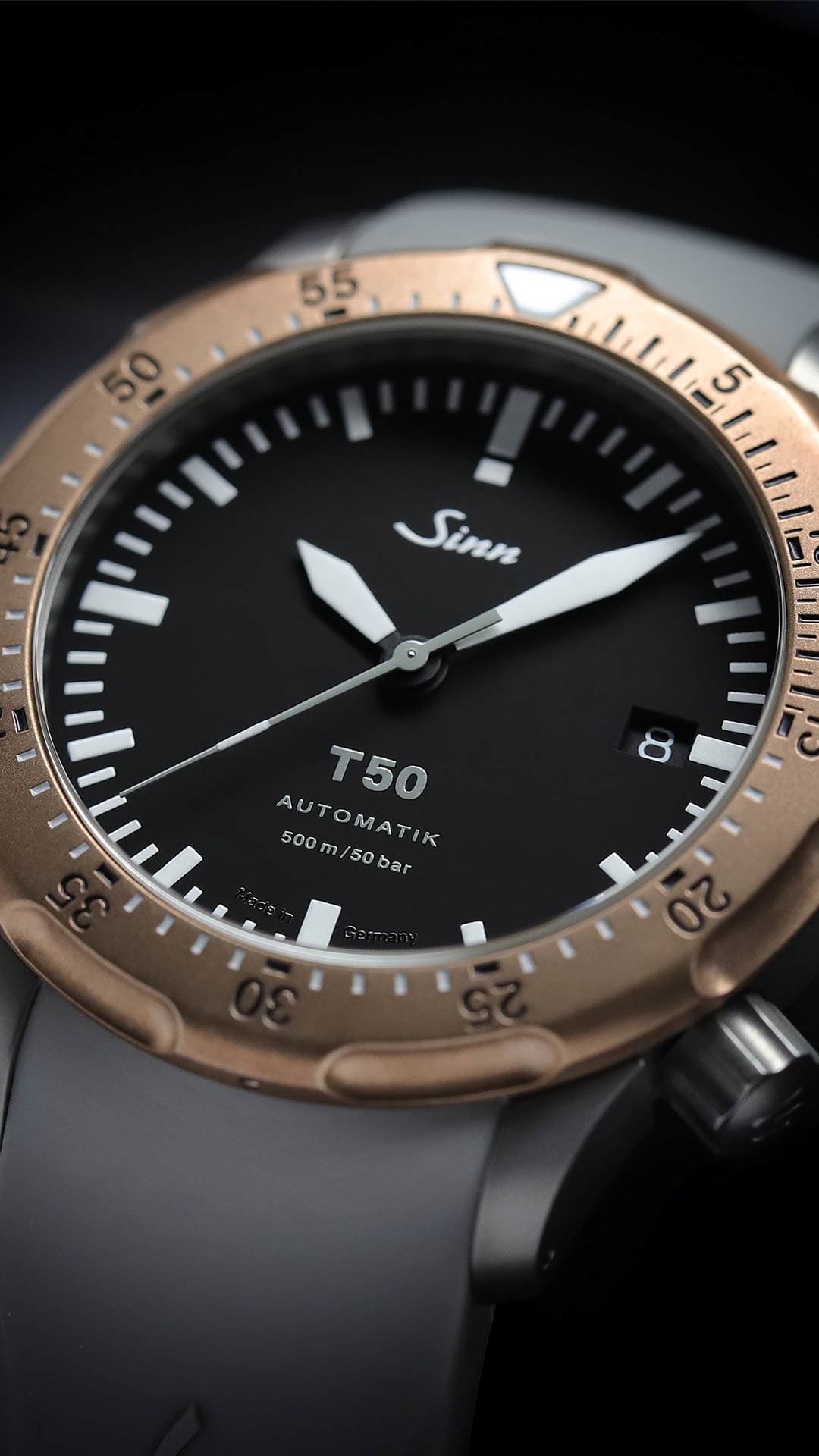 T50 with titanium case and Goldbronze bezel in close-up.