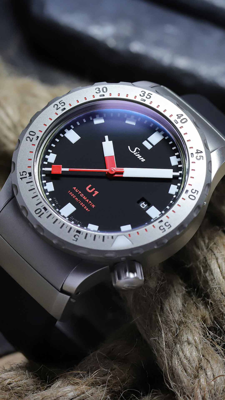 Sinn U1 made of submarine steel with black dial and stainless steel bracelet.
